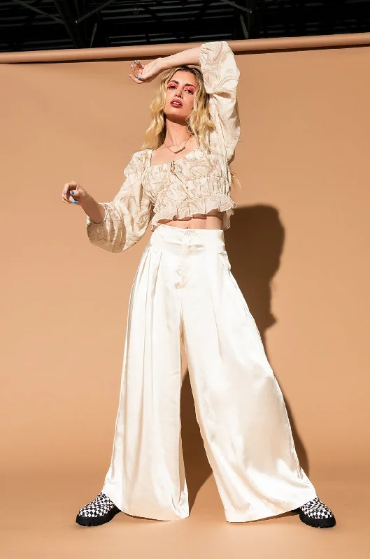 Slaying Luxe Satin Trousers in Ivory